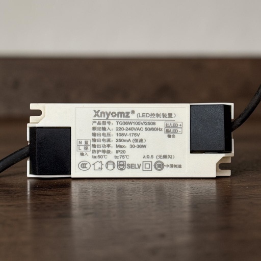 [Xnyomz TG36W105V/2508
Xnyomz®（LED控制装置）
产品型号：TG36W105V/2508
额定输入：220-240VAC 50/60Hz
输出电压：108V-175V
输出电流：250mA（恒流）
输出功率：Max: 30-36W
防护等级：IP20
ta:50°C tc:75 °C Pf:0.5（无频闪）
中国制造] درايفر 36 وات 250 مللي امبير - علبه بلاستيك