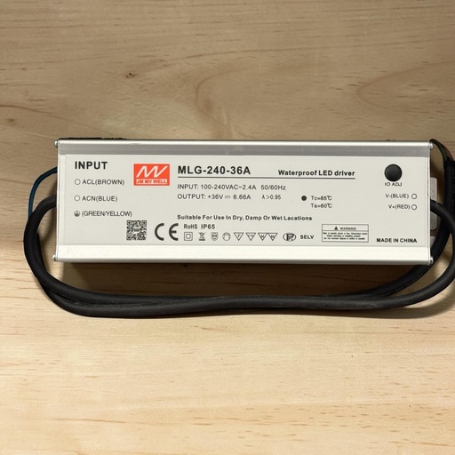 [JM MV WELL MLG-240-36A Waterproof LED driver
INPUT: 100-240VAC~2.4A 50/60Hz
OUTPUT: +36V == 6.66A PF>0.95
Tc=85°C Tа=60°C
Suitable For Use In Dry, Damp Or Wet Lacations
ROHS IP65
SELV
A WARNING
Plsk of eloctrie shock or fire: Disconnect powor bofore dervicing or instaling product
Do not connect outputs in series or paralel
MADE IN CHINA] درايفر 240 وات - منويل 6660 مللي امبير